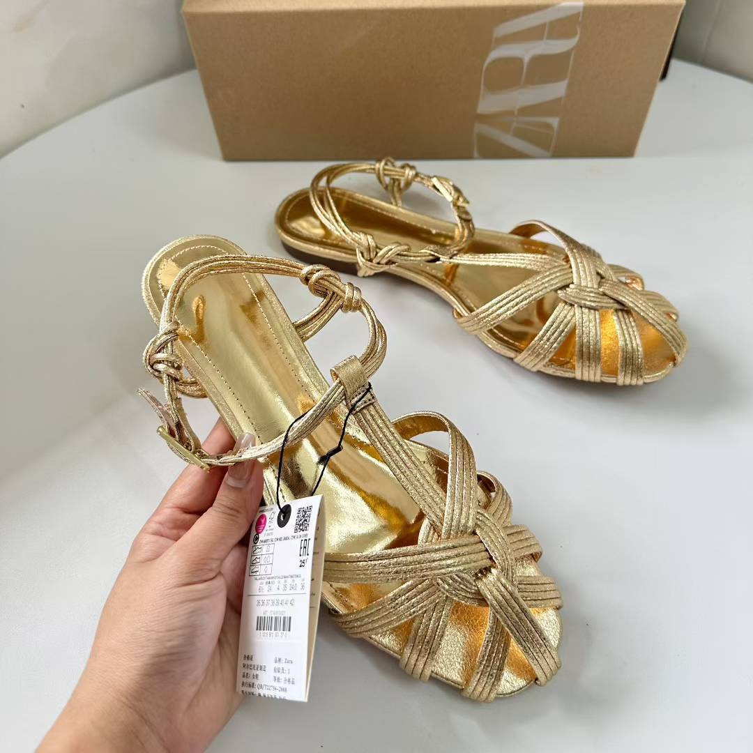 JHC-HB-034 | Woven Cutout Metallic Gold Round-Toe Flat Gladiator Sandal angle 3
